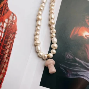 Mushie All-White Cuarzo Rosa